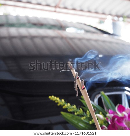Smoke, incense to pay homage.
