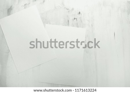 Empty white frame on the wall background. The concept of design and font inscriptions and image placement