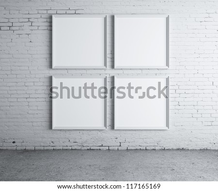 four blank frame on a concrete wall