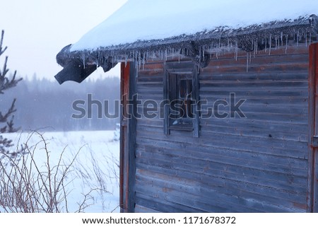 wooden church in Finland / winter landscape in Scandinavia view of the wooden church, old architecture
