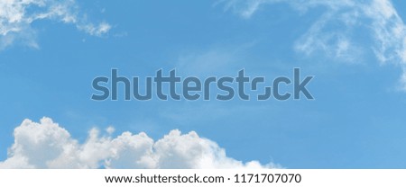 white cloud and blue sky background with copy space