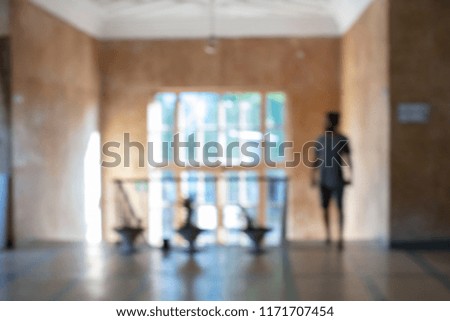 Abstract Blur Image of People Walking at Corridor