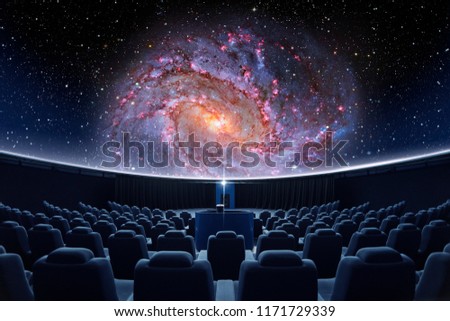 A spectacular fulldome digital projection of galaxy at the planetarium Royalty-Free Stock Photo #1171729339