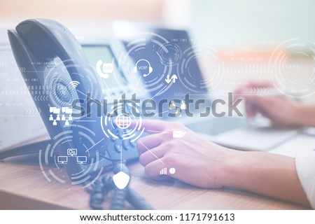 close up employee call center man hand point to press button number on telephone office desk with virtual communication technology concept Royalty-Free Stock Photo #1171791613