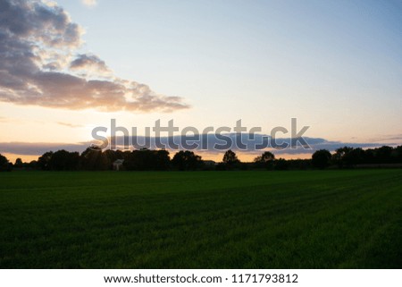 Landscape picture with romantic evening sky. Location: Germany, North Rhine - Westphalia, Borken