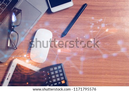 computer with office object gadget technology on wood table background in network concept