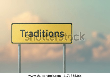 TRADITIONS - yellow road sign with the inscription 