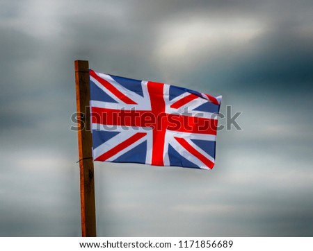 Union Jack with gathering storms clouds