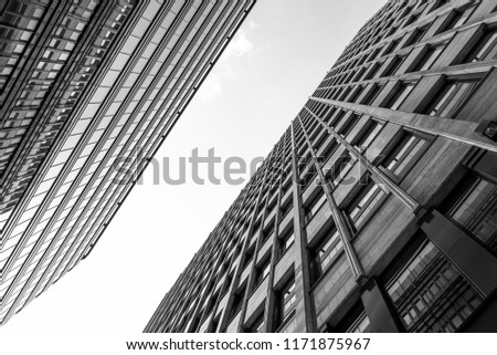 Perspective view from below on the closely facing walls of office buildings