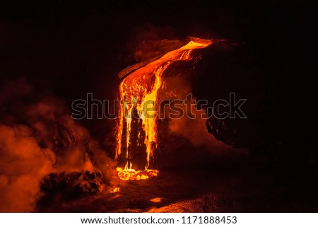 Lava dripping down a cliff Royalty-Free Stock Photo #1171888453