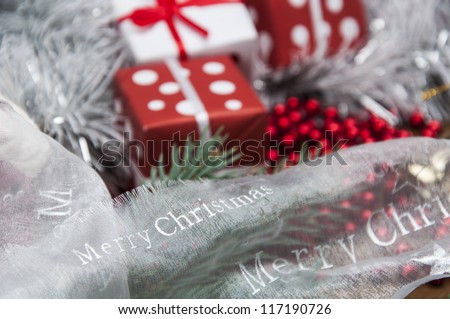 Christmas stuff on wooden table with dark background