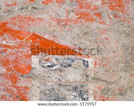 Stock macro photo of the texture of dirty orange painted metal.