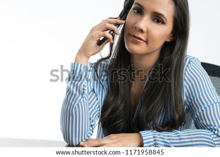 Beautiful office woman talking on the phone 