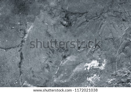 Black stone wall texture background. Gray pattern of rock from nature.