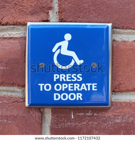 Press To Operate Door Sign for handicapped and disabled access.