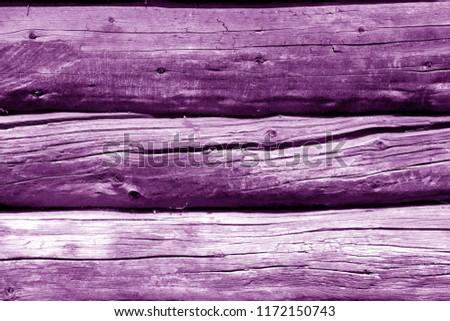Old wooden wall in purple color. Abstract background and texture for design.