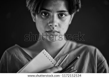 portrait girl artist / genre portrait of a poor girl, the concept of education, training, art. Art school, teen girl