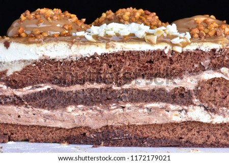 chocolate cake on a black background,