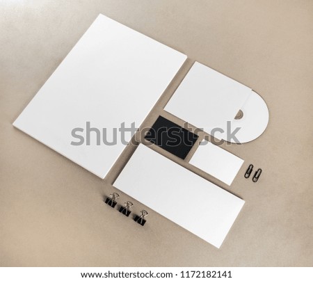Blank stationery set on craft paper background. Template for branding identity. For graphic designers portfolios. Top view.