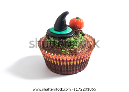 Halloween Holiday food colorful fancy brownies cupcake with witch and pumpkin fondant decorate  on white background