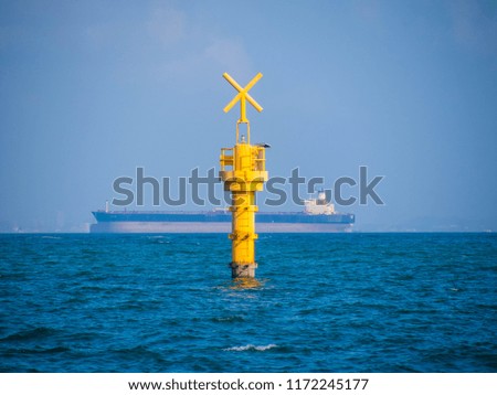 Yellow Buoy on Ocean 