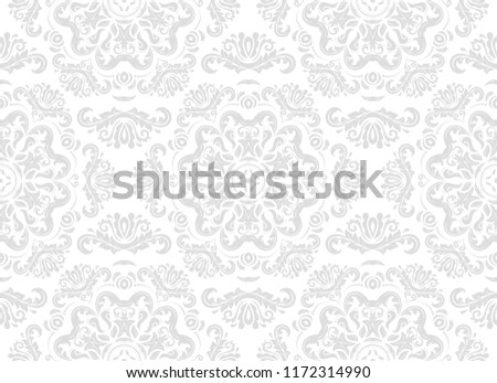 Classic seamless vector pattern. Damask orient light silver ornament. Classic vintage background. Orient ornament for fabric, wallpaper and packaging