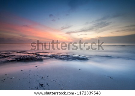long expose effect of sunrise seascape. soft focus due to long expose.