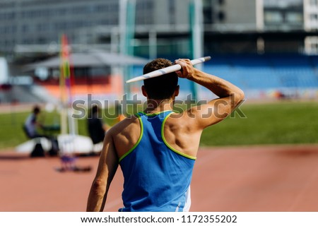 javelin throw back athlete javelin thrower attempt in competition Royalty-Free Stock Photo #1172355202