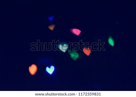 Abstract blurred hearts light bokeh texture background