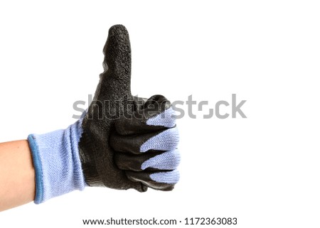 Hand wearing working protective glove giving the thumbs up sign isolated on white background.