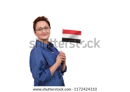 Yemen flag. Woman holding Yemen flag. Nice portrait of middle aged lady 40 50 years old with a national flag isolated on white background.
