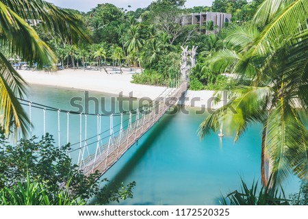 Suspension Bridge in Palawan Beach, Sentosa Island. Singapore. Royalty-Free Stock Photo #1172520325