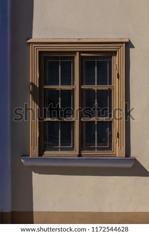 Background for design of a wall texture and windows of old houses