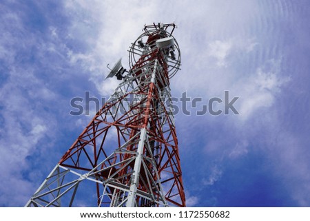 Telecommunication tower against the blue sky