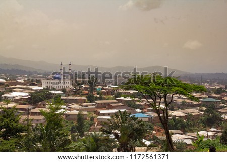 A panorama view of downtown Bamenda, capital of the Northwest region of Cameroon. Royalty-Free Stock Photo #1172561371