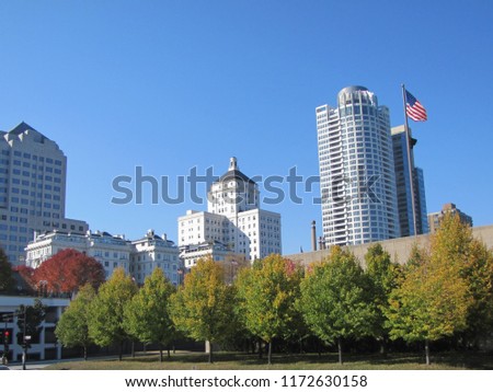 Modern buildings rise into the bright blue sky, as a part of the City of Milwaukee,WI landscape.