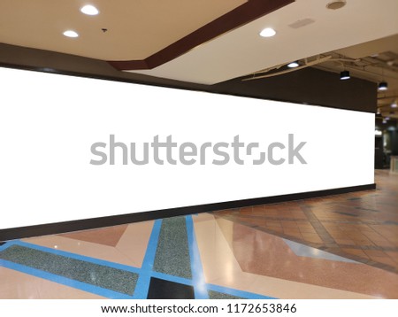 Large advertise banner template.Empty billboard for announcement promotion information.Trendy and End of sale season message in shopping mall.