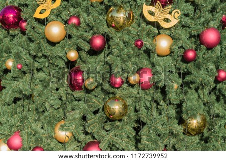Christmas and New Year holidays background.  Christmas tree decorated with balls and garlands