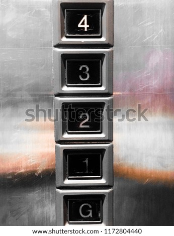 Numeric buttons in the elevator.closedup number one two three four