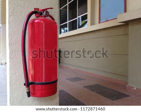 fire extinguisher for fire protection on wall