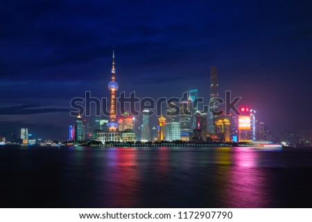Twilight shot with the Shanghai skyline and the Huangpu river in Shanghai, China