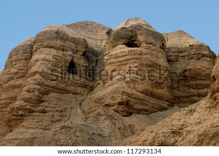 Qumran caves in Qumran National Park near the Dead Sea Israel where the Dead Sea Scrolls discovered between 1946 and 1956.Qumran caves in Qumran National Park Israel. No people. Copy space Royalty-Free Stock Photo #117293134