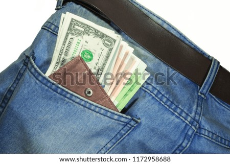 money in a jeans pocket