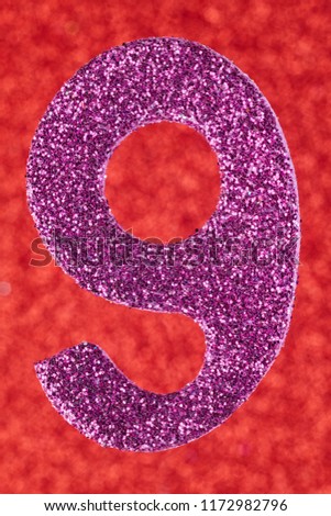 Number nine purple color over a red background. Anniversary. Vertical