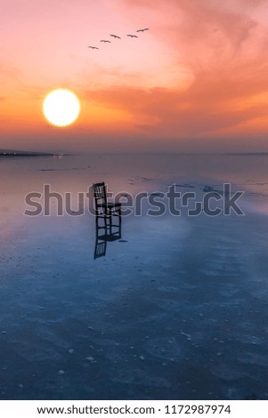 Salt Lake. The sunset and the reflection of the object in the lake. Incredible image.