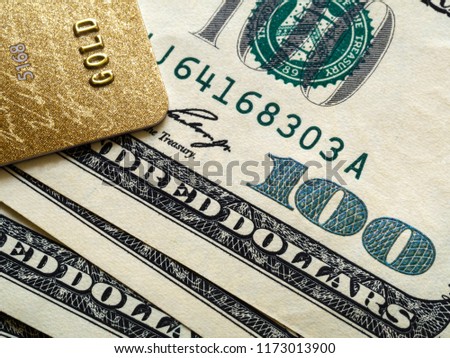 Bank card and one hundred dollar bills, macro