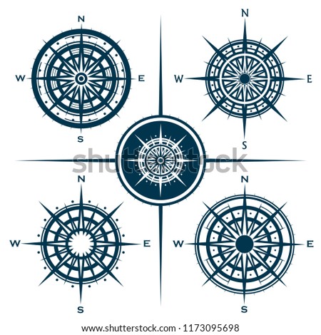 Raster set of blue isolated compass roses. Collection of different wind roses for graphic design. Raster illustration.