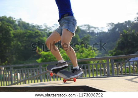 Skateboarder jumping in the skatepark