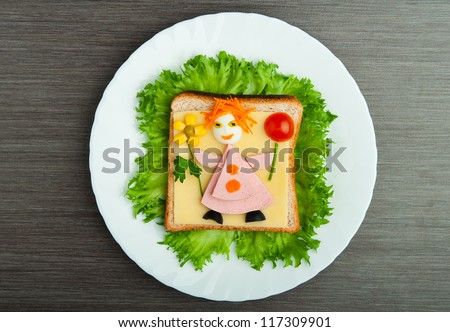 design food. Creative sandwich for a child with a picture little man