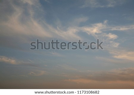 Abstract background clouds washed away by the air currents of the setting sun the sky was covered with turquoise warm autumn wind stroking the fluffy edges of the horizon